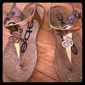 Bebe gold women’s sandals